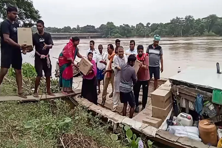Relief materials being distributed to flood-affected residentsof Kendrapara