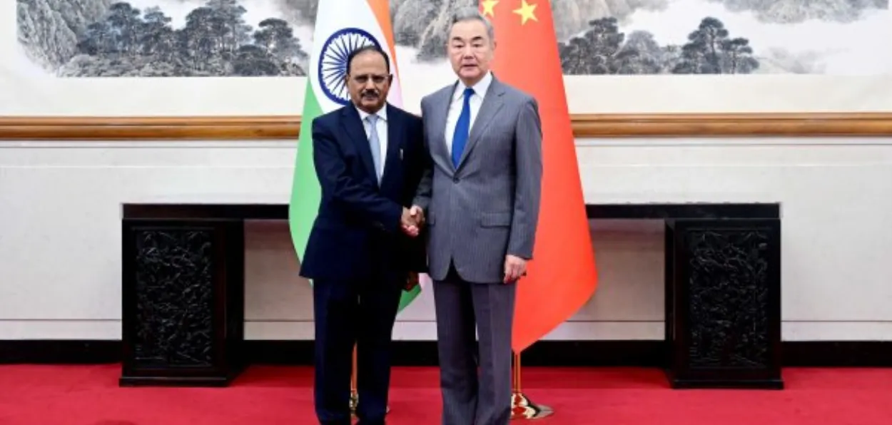 NSA Ajit Doval with Chinese Foreign Minister and NSA  Wang Yi in Beijing