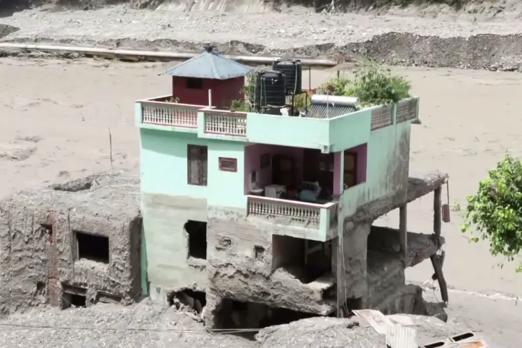 Mint green house stand firm in Trishuli amid Nepal floods 