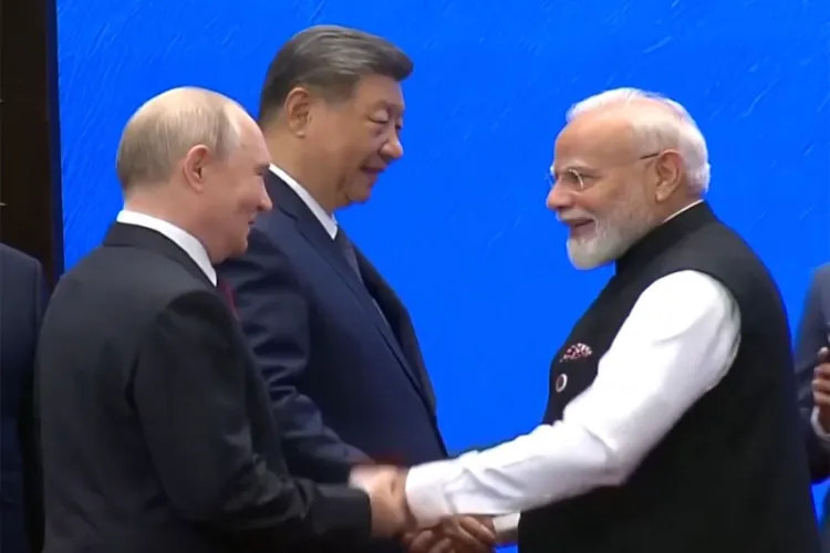 PM Modi, President Xi Jinping, President Putin shake hands at SCO summit