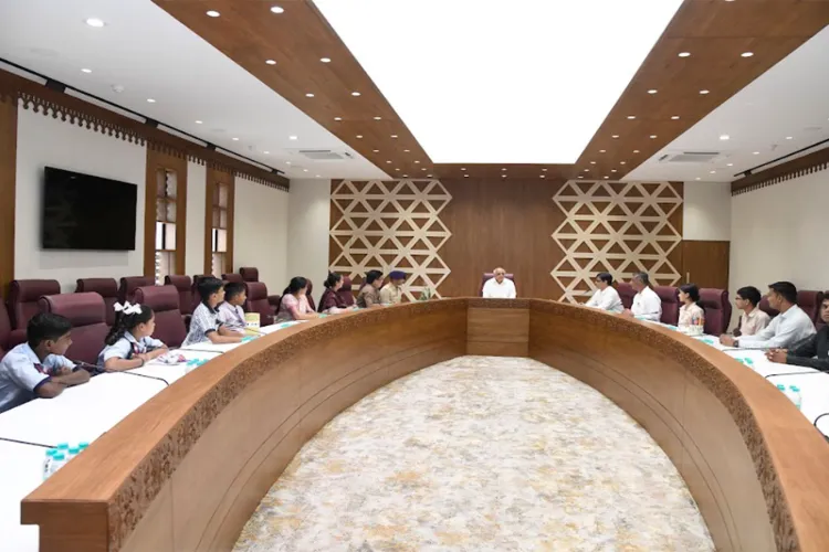 Gujarat CM Bhupendra Patel interacts with students from schools in Gandhinagar who visited his residence on the occasion of Teachers' Day