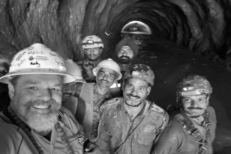 Australian tunnel rescue expert Arnold Dix with Indian rescue personnel inside a tunnel.