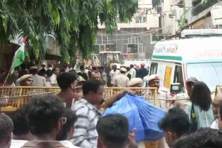 An ambulance at the rescue site in Satya Niketan, Delhi