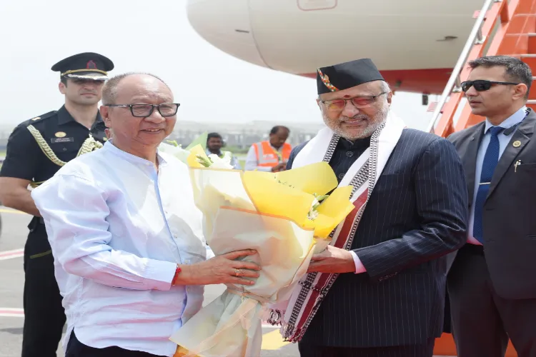 Vice President CP Radhakrishnan being received by Manipur Chief Minister Yumnam Khemchand Singh upon his arrival at the Bir Tikendrajit International Airport, in Imphal, Manipu