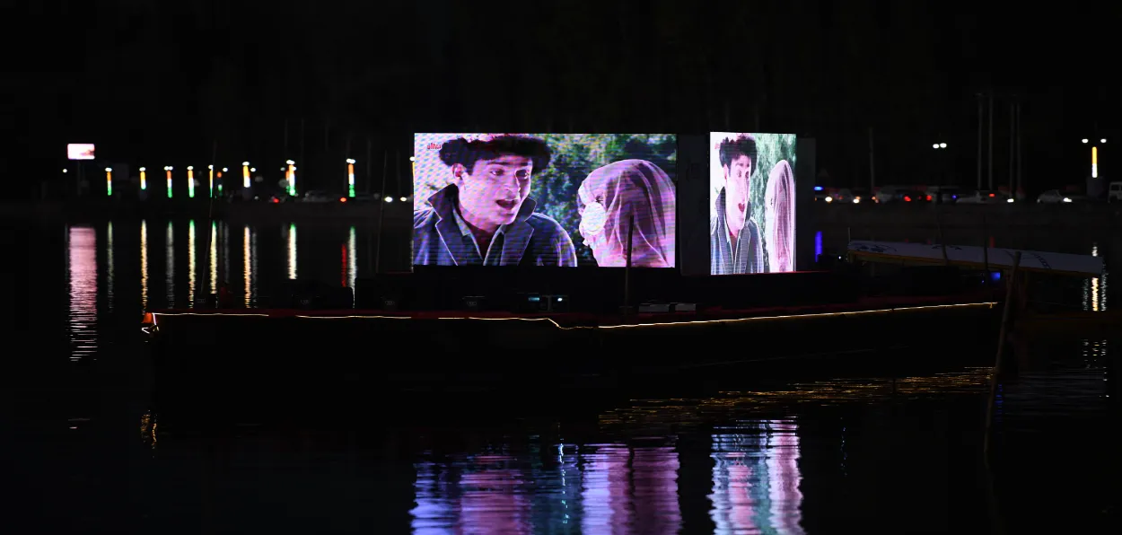 Floating cinema screen in Dal Lake (Basit Zargar)