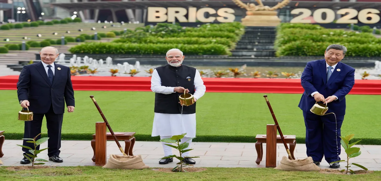 Prime Minister Narendra Modi with President Vladimir Putin and Xi Jinping at the BRICS Summit