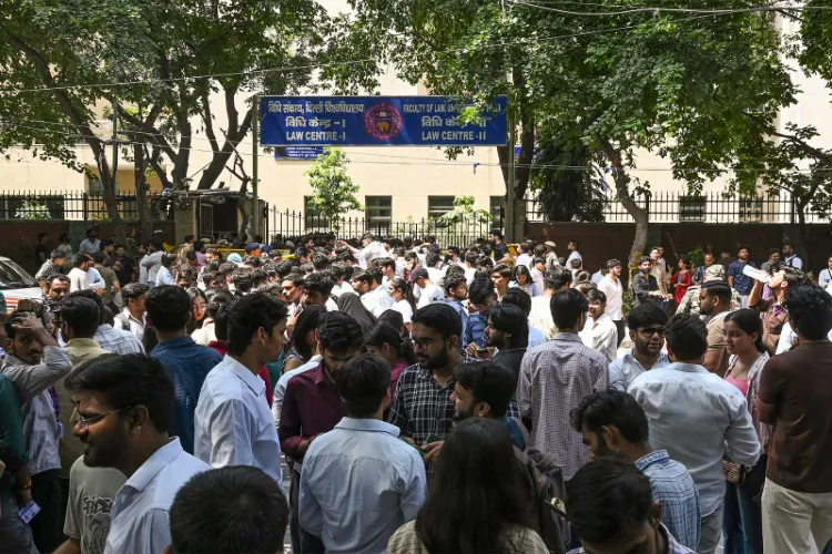 Students gather outside Delhi University during DUSU elections 