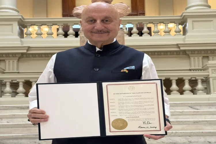 Anupam Kher with his commendation from Georgia Governor 