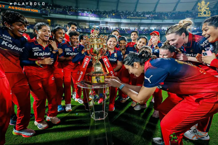 RCB team with the WPL trophy