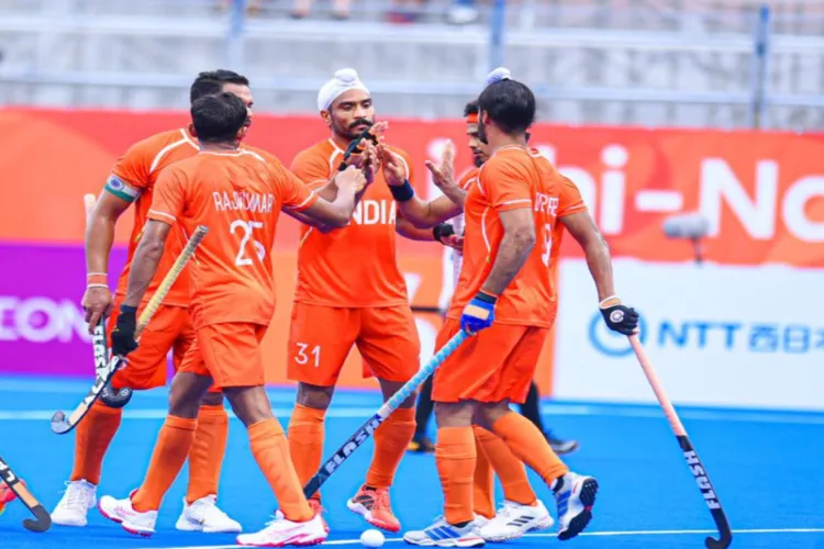 India men's hockey team celebrating 