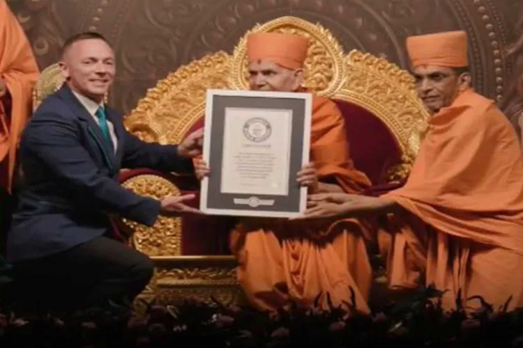 Mahant Swami Maharaj presented with certificate of Guinness World Records 