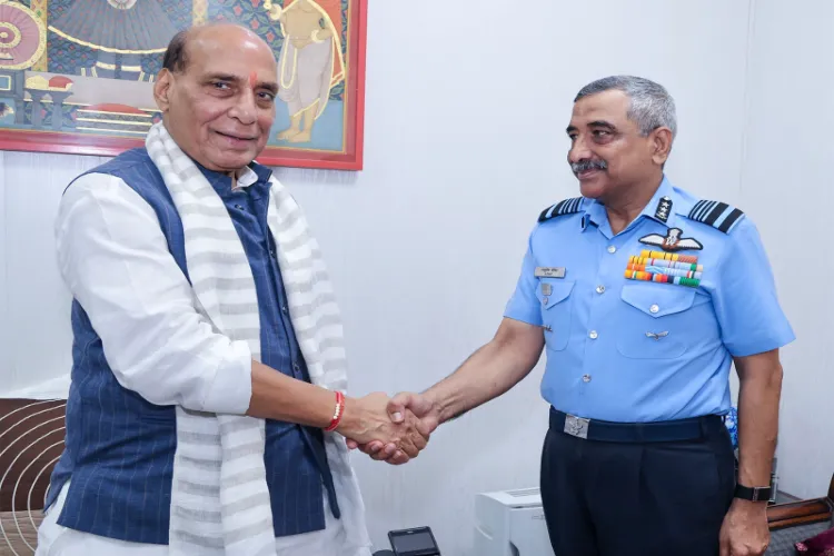 Air Marshal Ashutosh Dixit and Defence Minister Rajnath Singh