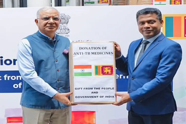 India’s High Commissioner to Sri Lanka Santosh Jha hands over anti-TB medicines to Sri Lankan Minister of Health and Mass Media Nalinda Jayatissa.