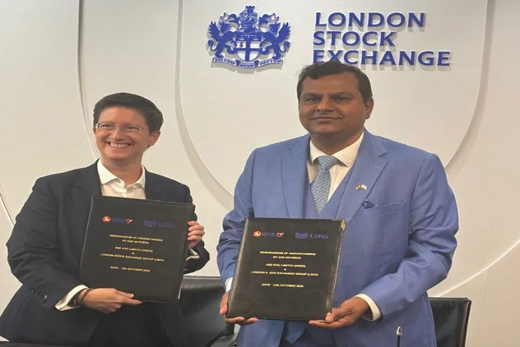 Dame Julia Hoggett and V. Balasubramaniam 