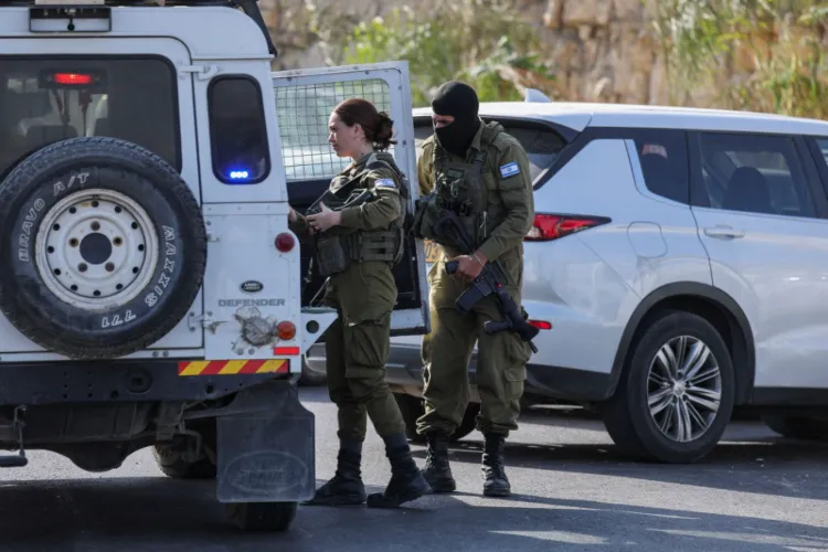 Israeli security forces at incident site in Hebron