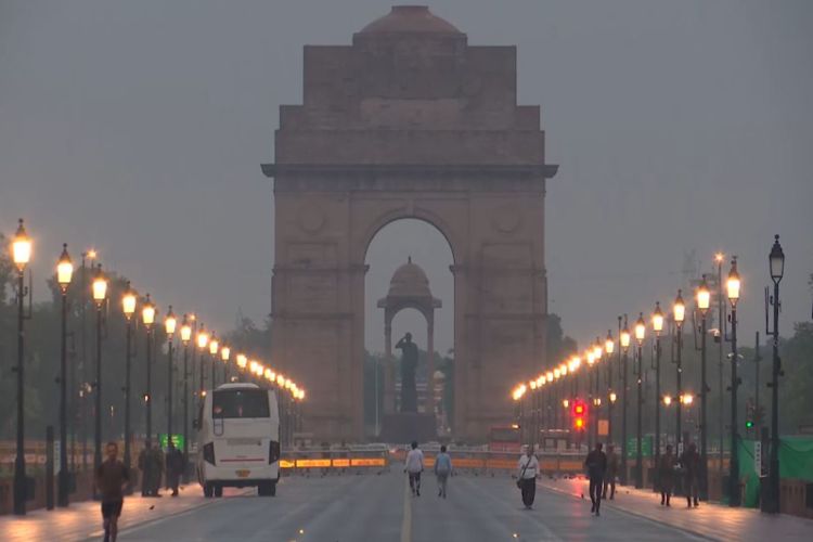Visuals show India Gate amid wet roads following overnight showers in New Delhi 