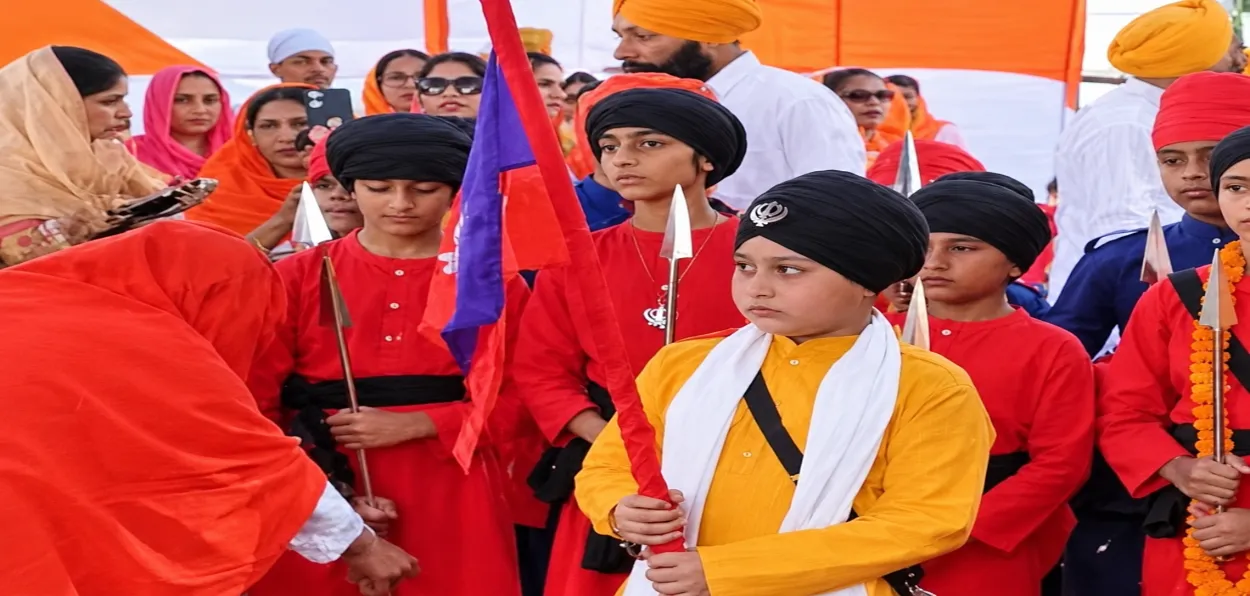 Children participating in religious procession in Digboi