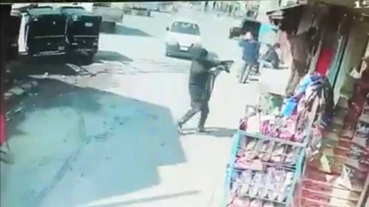 A militant captured in a CCTV camera shooting at Akash Mehra