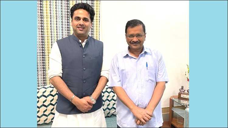 Faisal Patel with Kejriwal