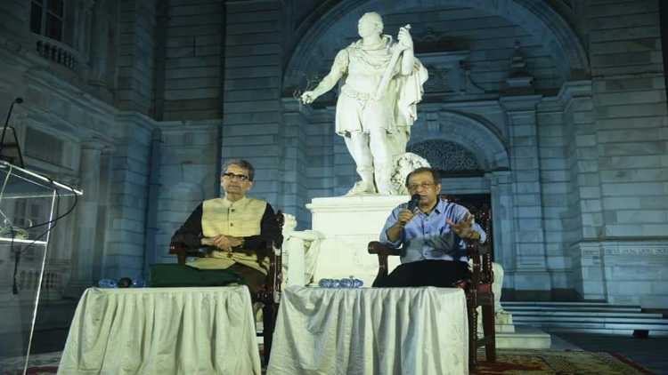 Shahanshah Mirza with a speaker