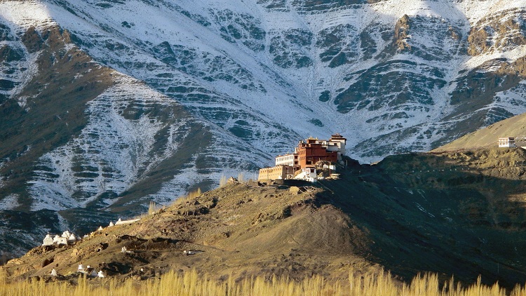 A view of Matho Monastery in the back group of Snow covered mountain, in Leh on Friday
