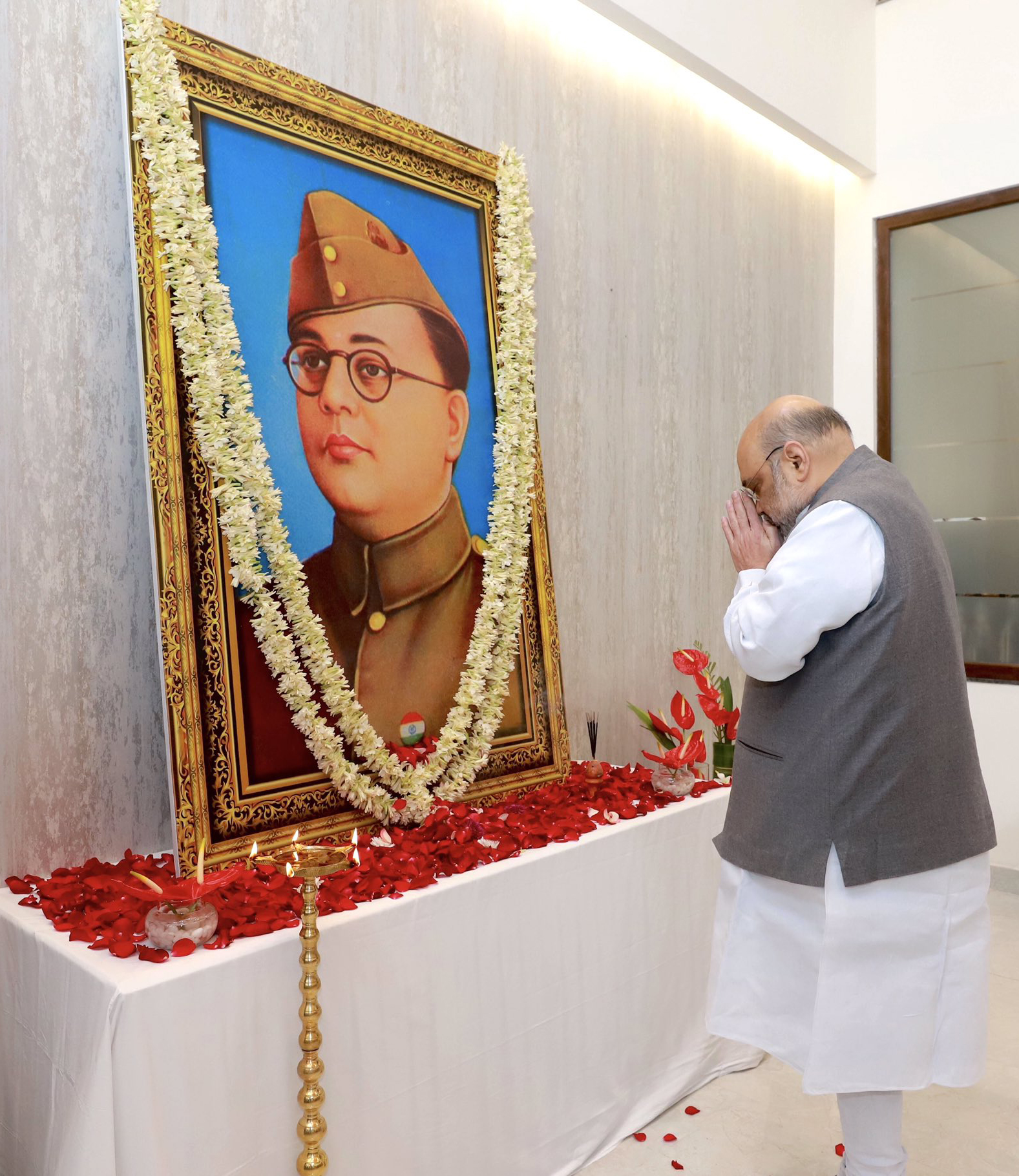 Union Home Minister Amit Shah pays floral tribute to Netaji Subhas Chandra Bose on his 125th birth anniversary, in Guwahati on Saturday