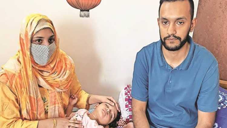 Oniba and Sharique Qureshi with their daughter in Mumbai