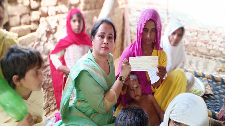 Ela Mishra with women