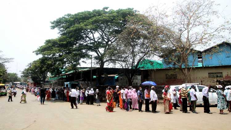 People outside inoculation center in Mumbai