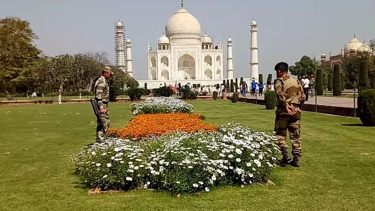 Security personnel conducting checks at Taj Mahal