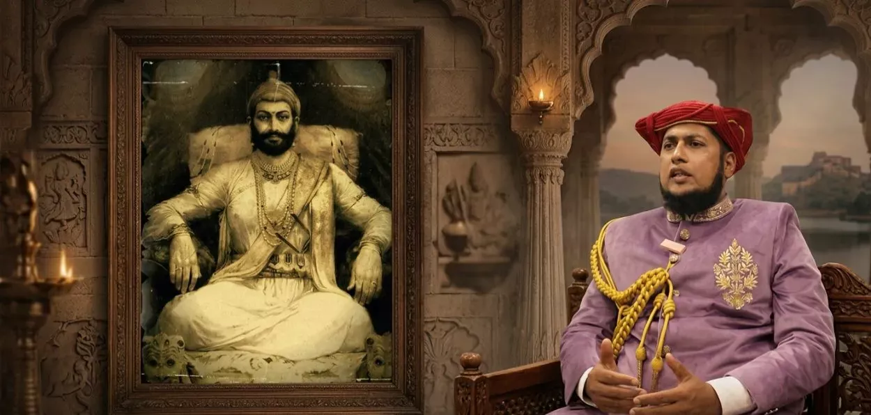 Sohail Shaikh with the portrait of his ancestor