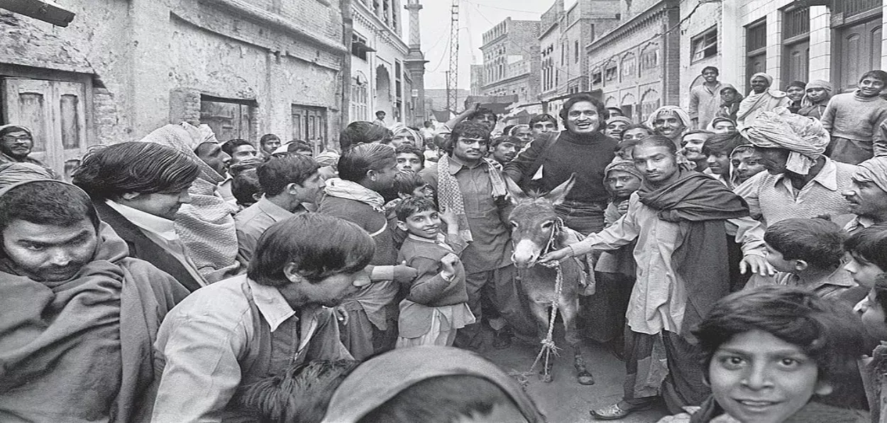Raghu Rai riding a doney in Pakistan as a mark of respet shown by locals (Picture by author)