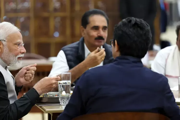 N K Premachandran and PM Modi