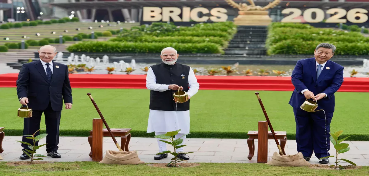 Prime Minister Narendra Modi with President Vladimir Putin and Xi Jinping at the BRICS Summit