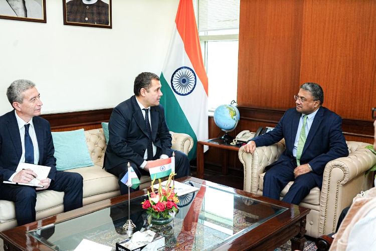 Uzbek Foreign Ministry official Pirimkulov Gulomjon Shodmonkulovich (Centre) and MEA Secretary (West) Sibi George (Right) 